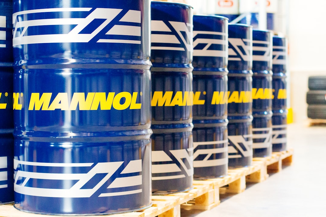 Industrial oil and lubricant drums in warehouse
