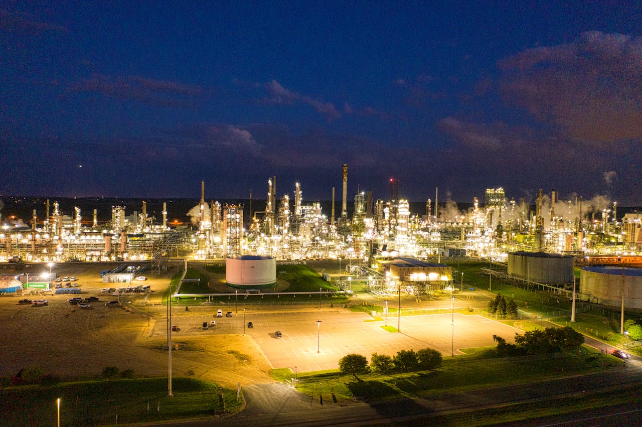 contact-img A stunning aerial shot of an illuminated oil refinery at night showcasing industrial production in Rosemount, MN.
