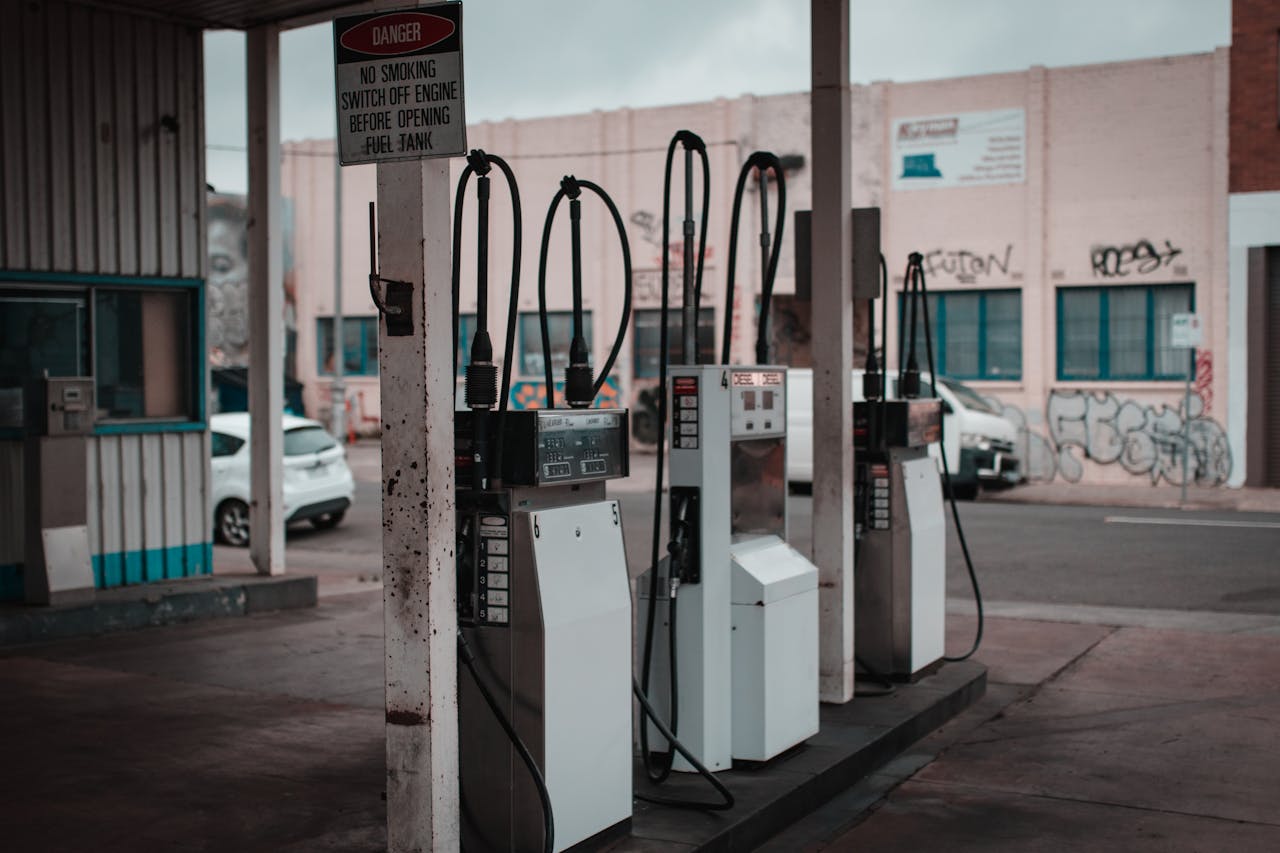 about-01 Empty gas station with visible graffiti in Collingwood, Australia.
