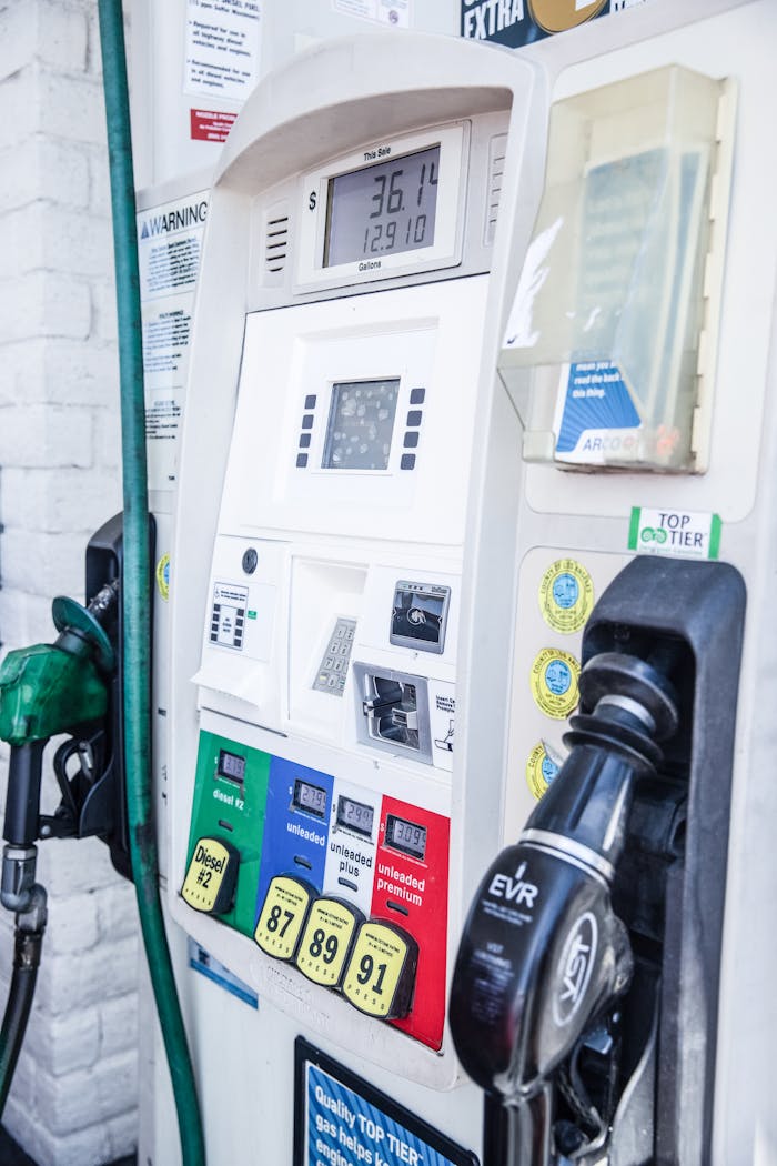 our-services-3 Close-up of a modern gas pump at a Los Angeles fuel station showing fuel options and digital display.